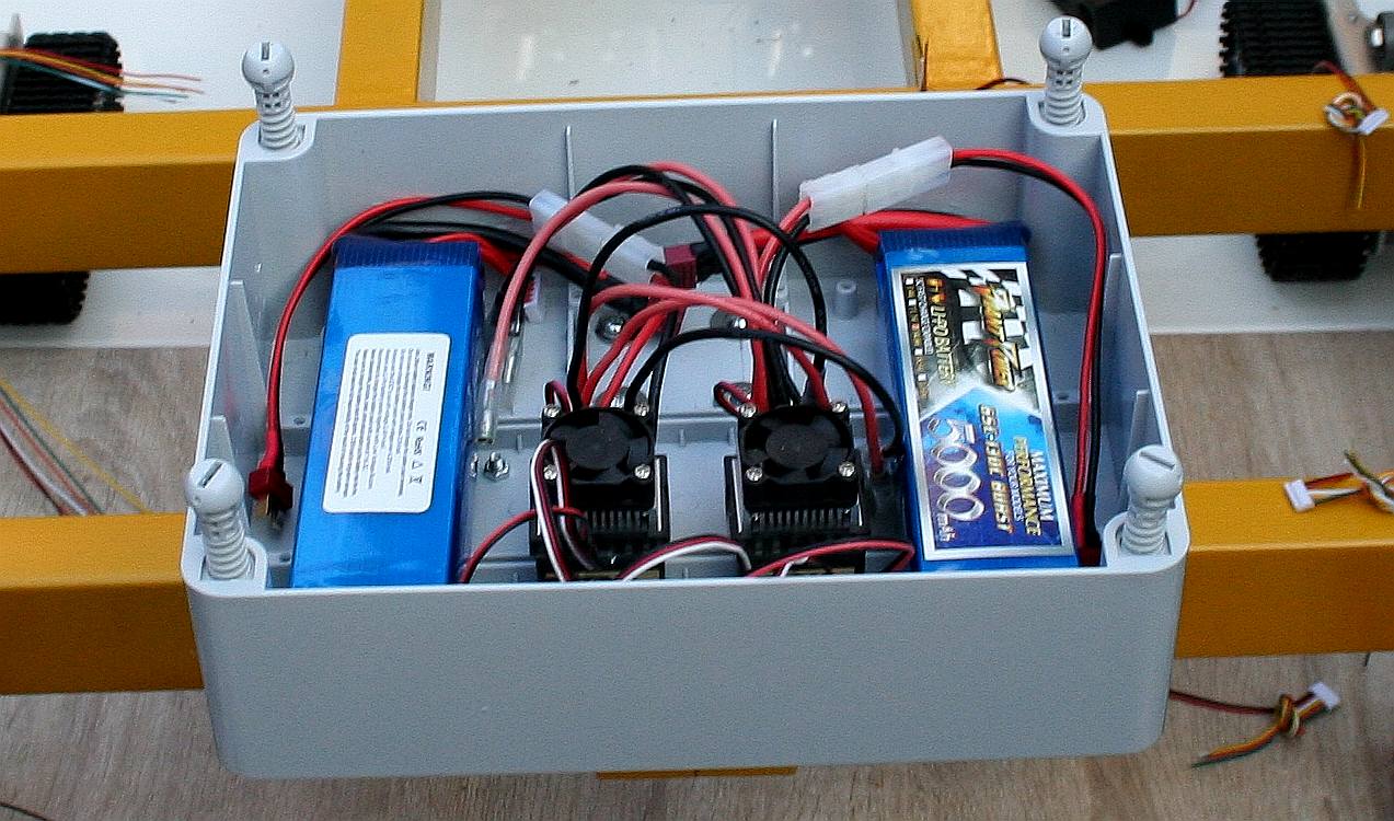 Waterproof PVC enclosure housing batteries and motor controllers