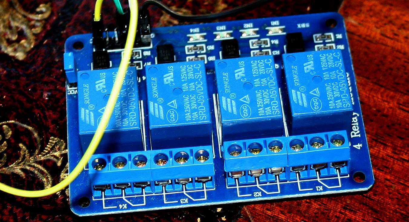 Power relays as a bank of four on a printed circuit board